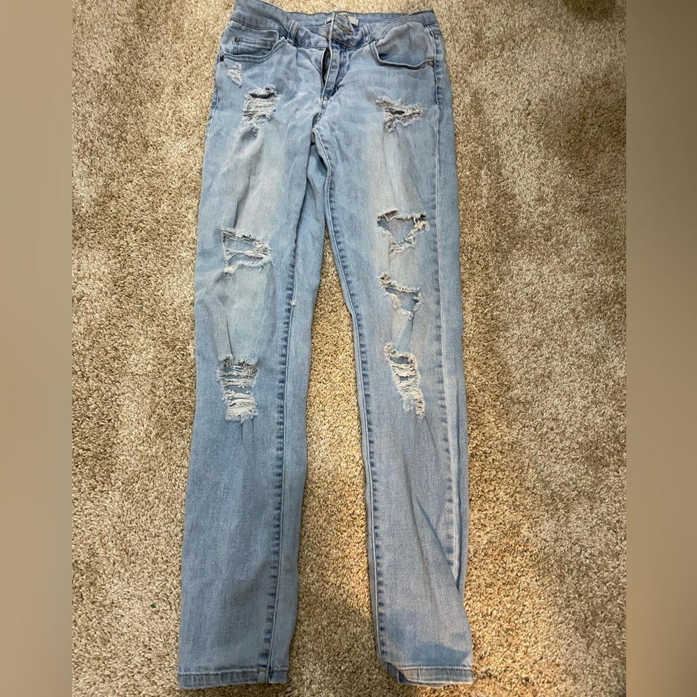 Ripped blue jeans